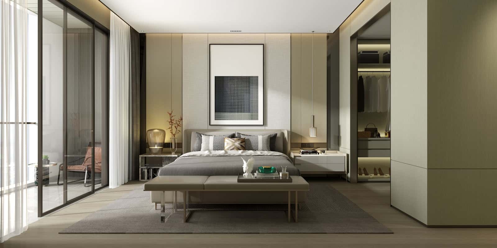 A grey bed in a bright hotel bedroom